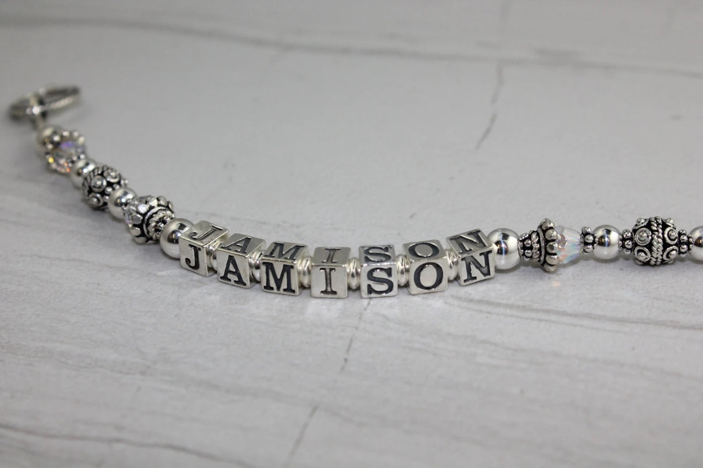 beautiful Sterling Silver single strand mothers bracelet with child names - toggle clasp for cloure