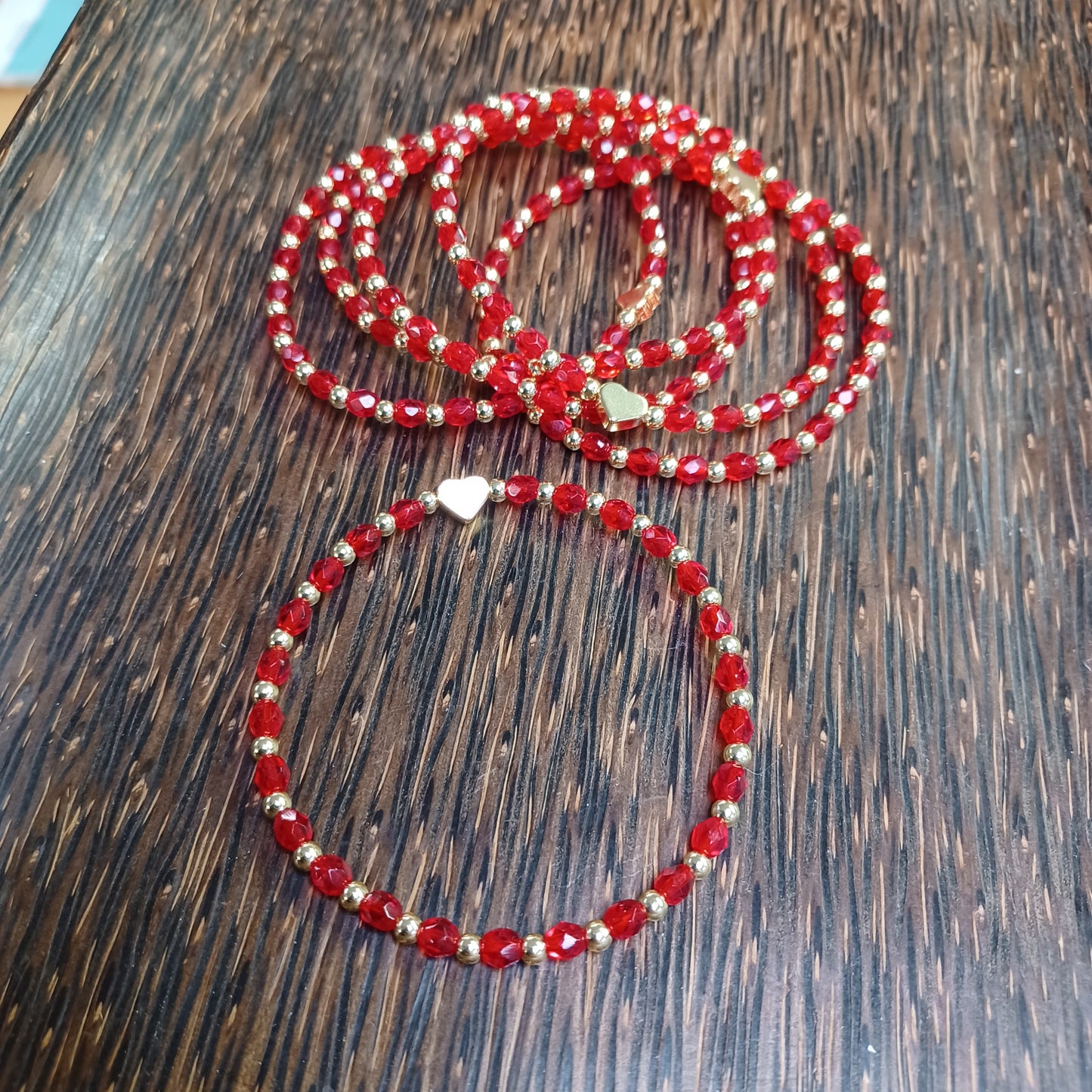 Dainty Red and Gold beaded Bracelet with Gold Heart Accent