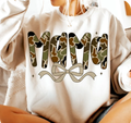 Tan sweatshirt with camouflage 'MOM' text and a bow design.