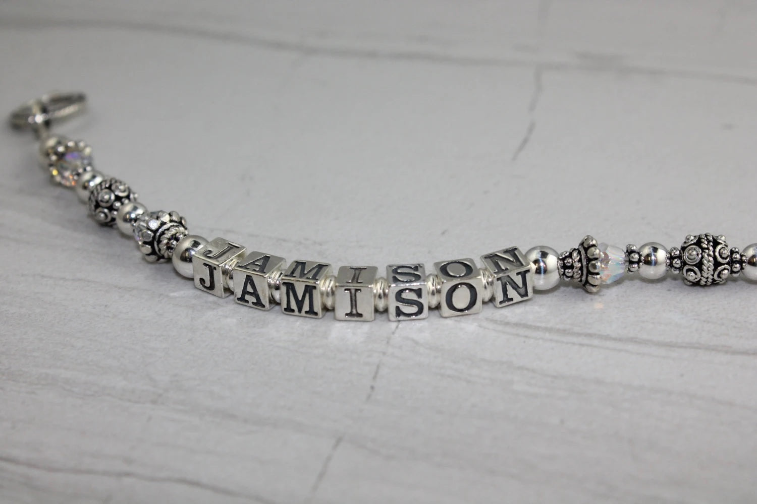 beautiful Sterling Silver single strand mothers bracelet with child names - toggle clasp for cloure