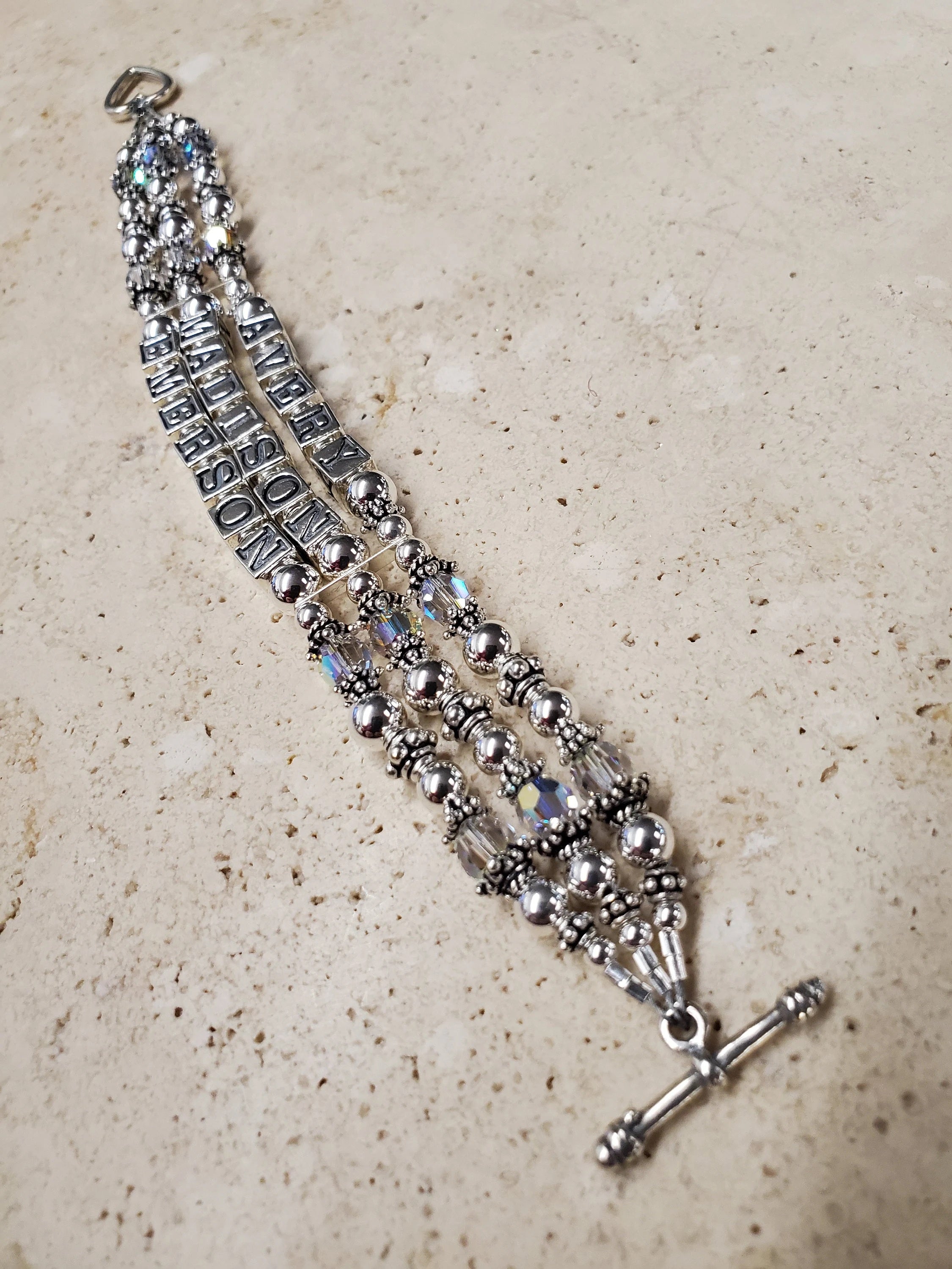 Stunning 3 strand mothers bracelet made of sterling silver and high quality crystals. Made to order 